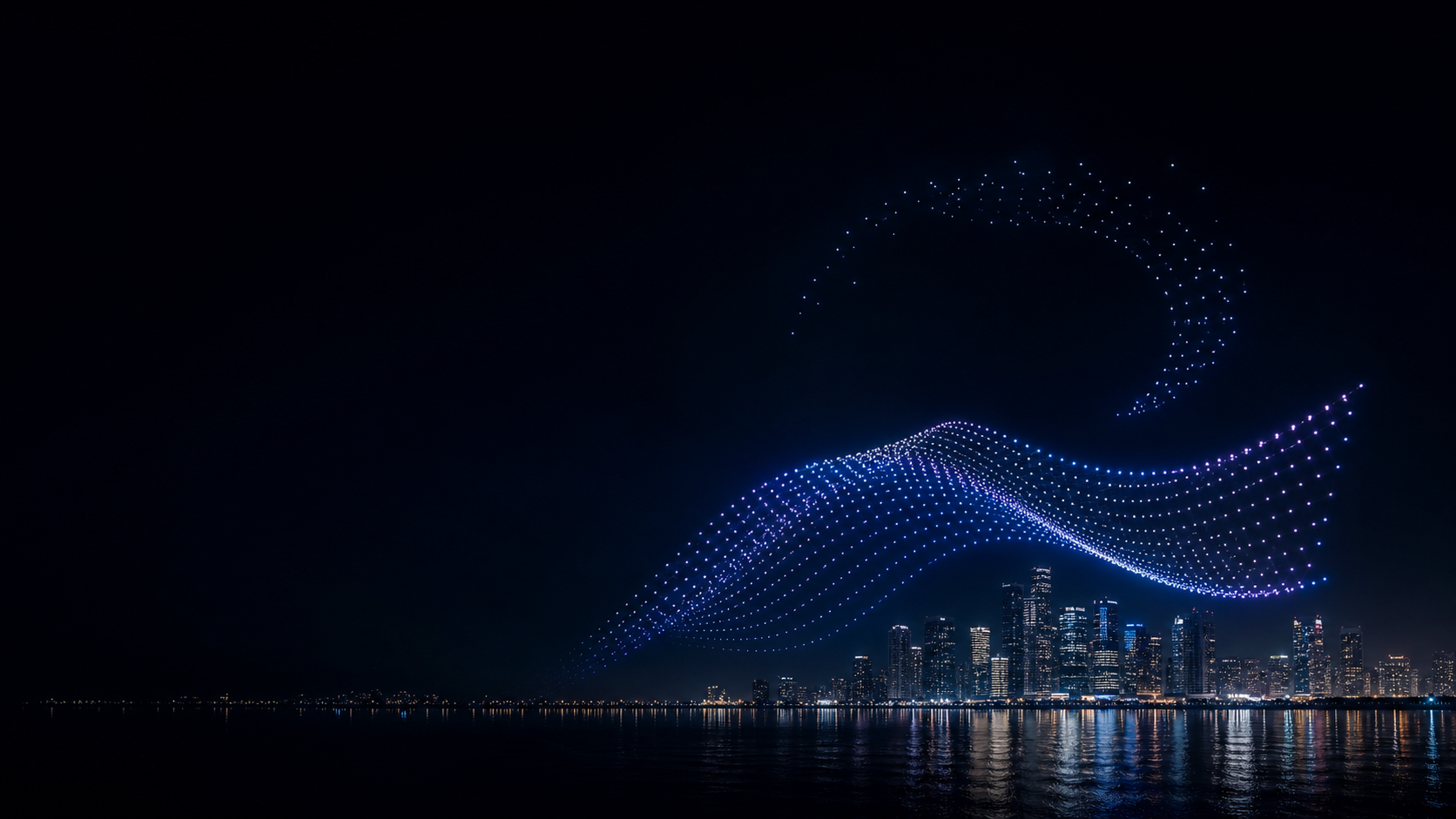 Coordinated drone light formation above a night city skyline